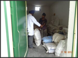 Sorting of raw material of herbs in raw material section of Dr. Asma Herbals Factory