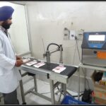 Another photo of Working of automatic Batch coding machine