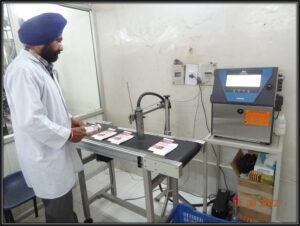 Another photo of Working of automatic Batch coding machine